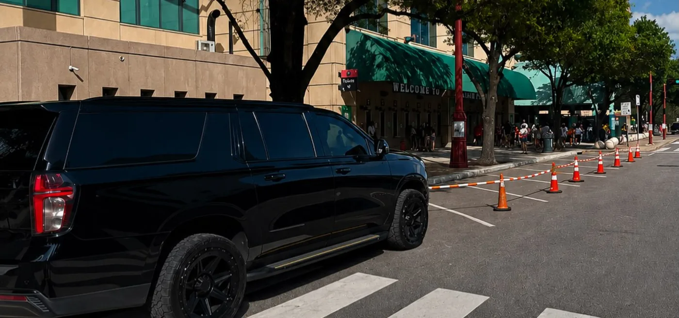 Black Suburban parked downtown